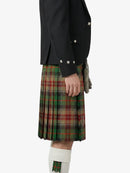 Person wearing a black jacket and green plaid kilt on a white background