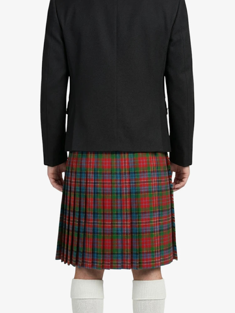 Person wearing a black jacket and red plaid kilt on a white background