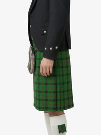 Green plaid kilt with a black jacket on a white background