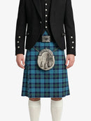 Person wearing a black jacket, blue plaid kilt, and white knee-high socks on a white background