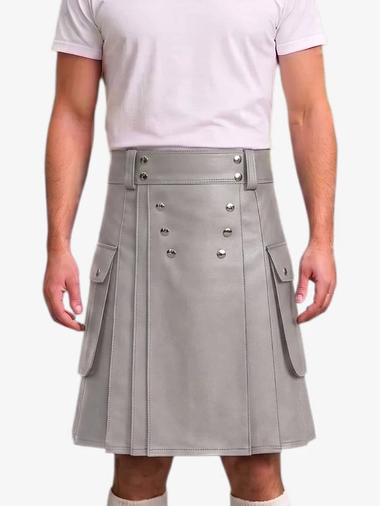 A person wearing a light gray faux-leather kilt with silver-tone metal snap details and side cargo pockets, paired with a white t-shirt against a plain white background.