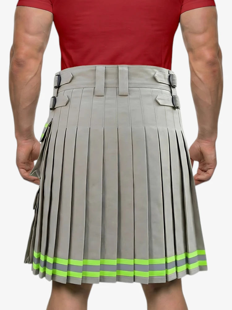 Person wearing a gray pleated kilt with green accents on a white background