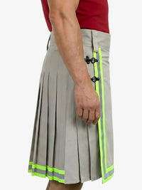 Gray pleated skirt with green accents worn by a person on a white background