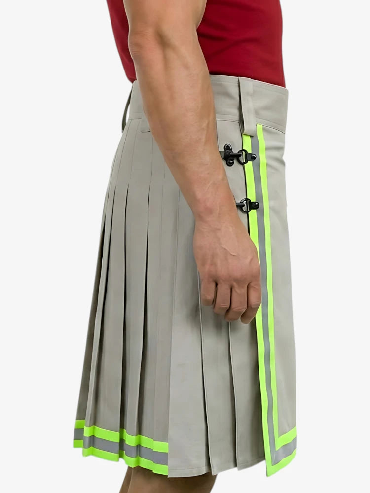Gray pleated skirt with green accents worn by a person on a white background