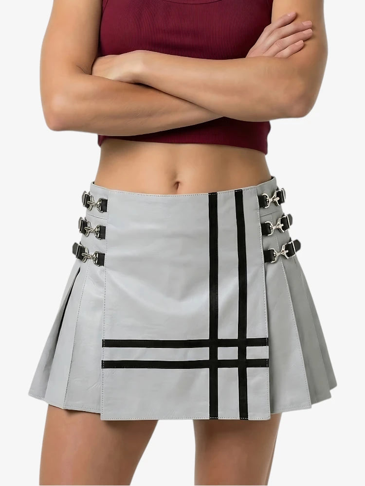 Gray pleated skirt with black accents worn by a person on a white background