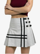 White skirt with black accents worn by a person on a white background