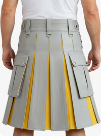 Gray and yellow pleated kilt worn by a person on a white background