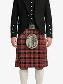 Person wearing a black jacket and red plaid kilt with a silver sporran on a white background