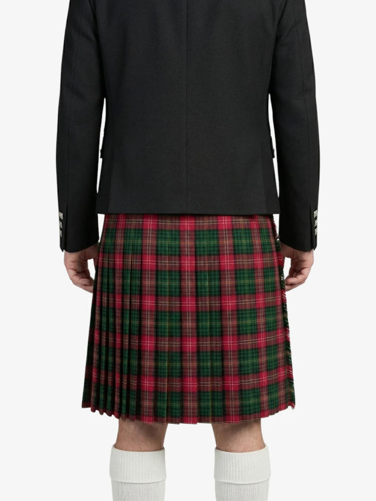 Person wearing a black jacket and red plaid kilt on a white background