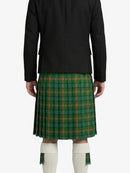Person wearing a green plaid kilt with a black jacket on a white background