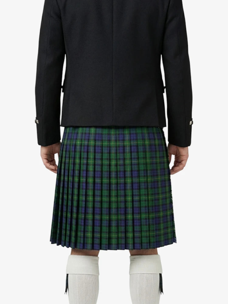 Person wearing a black jacket and green plaid kilt on a white background