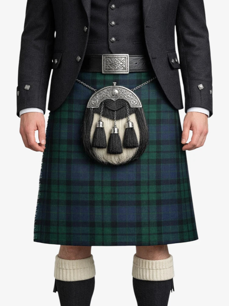 Person wearing a traditional Scottish kilt with a sporran on a white background