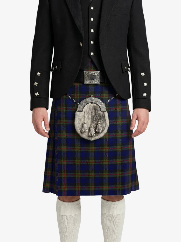 Person wearing a traditional Scottish kilt with a dark jacket on a white background