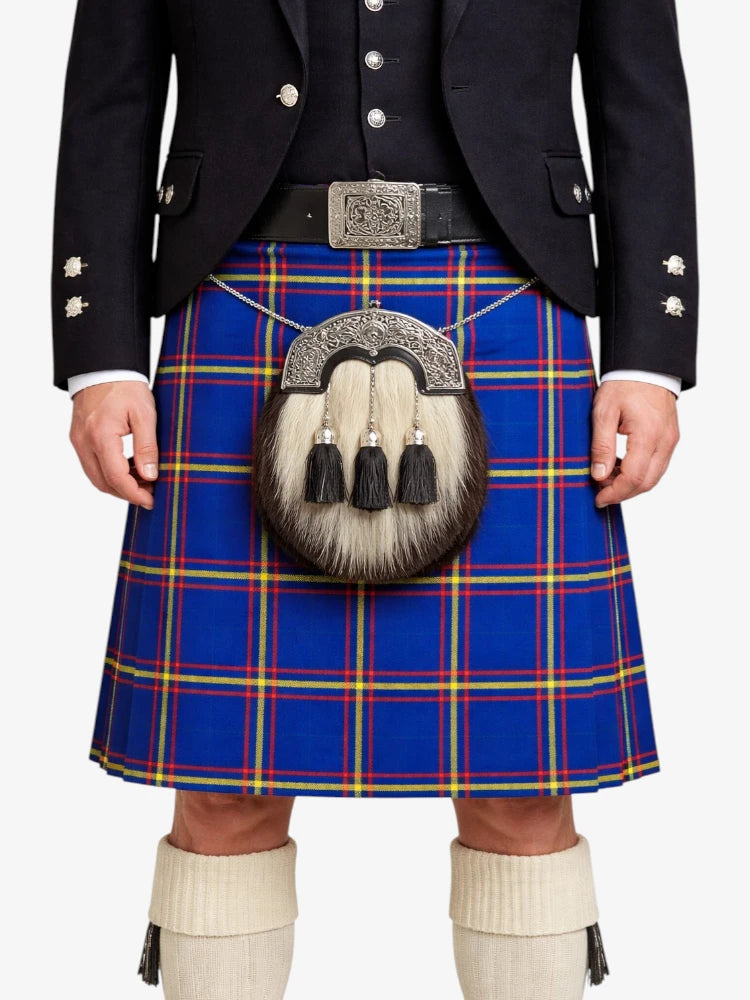 Person wearing a blue plaid kilt with a dark jacket and white knee-high socks on a white background