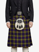 Person wearing a traditional Scottish kilt with a tartan pattern on a white background