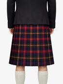 Person wearing a black jacket and red plaid kilt on a white background