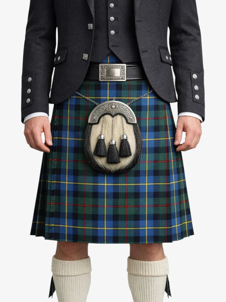 Person wearing a traditional Scottish kilt with a tartan pattern on a white background