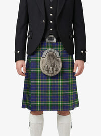 Person wearing a traditional Scottish kilt with a tartan pattern on a white background