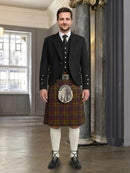 Man wearing a traditional Scottish kilt in an elegant interior setting