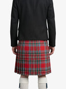 Person wearing a black coat and red plaid kilt on a white background