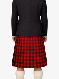 Person wearing a black coat and red plaid kilt on a white background