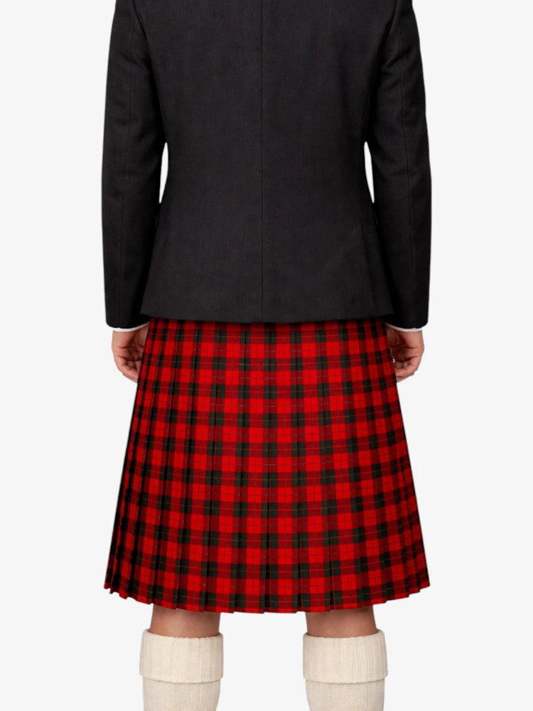 Person wearing a black coat and red plaid kilt on a white background