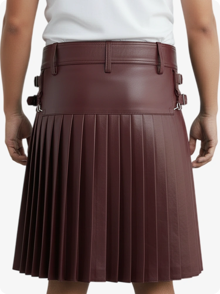 Maroon pleated kilt worn by a person on a white background