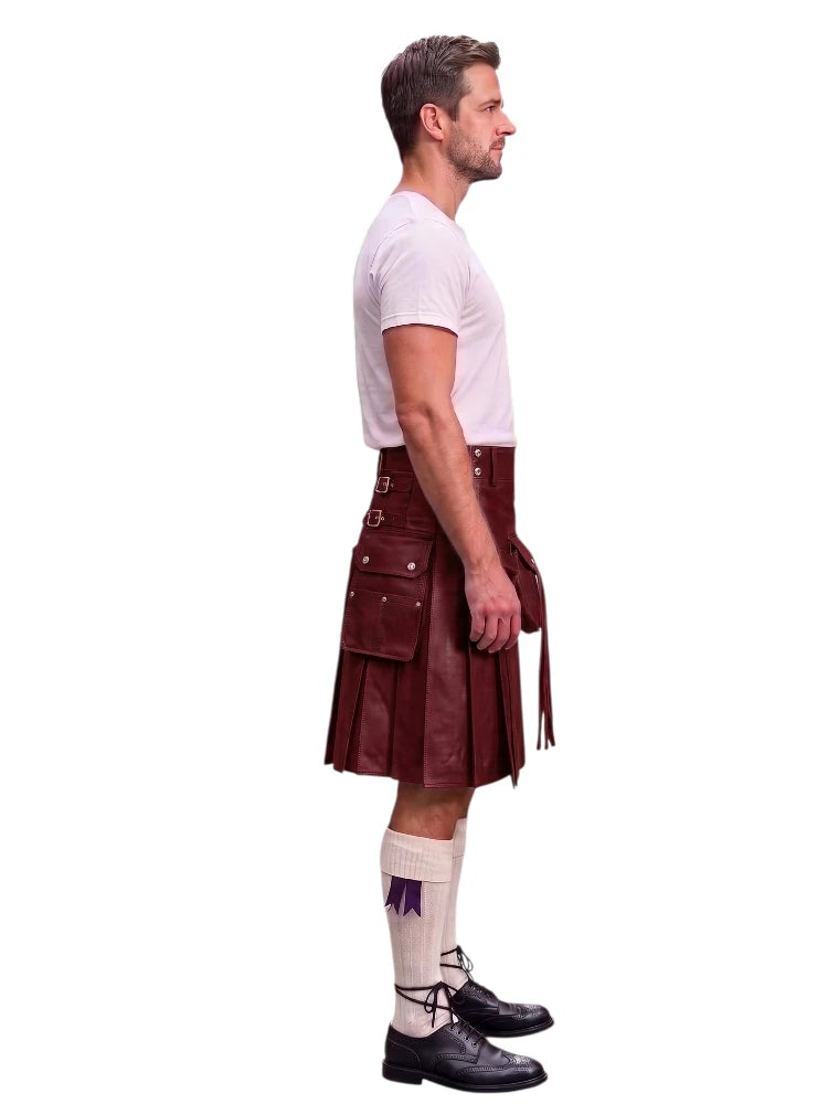 A man shown in profile wearing a dark red leather kilt with silver-toned metal hardware, a white t-shirt, white knee-high socks, and black leather shoes, set against a plain white background.
