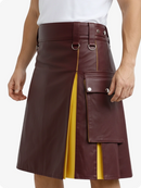 Brown leather skirt with yellow accents worn by a person on a white background