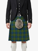 Person wearing a traditional Scottish kilt with a sporran on a white background