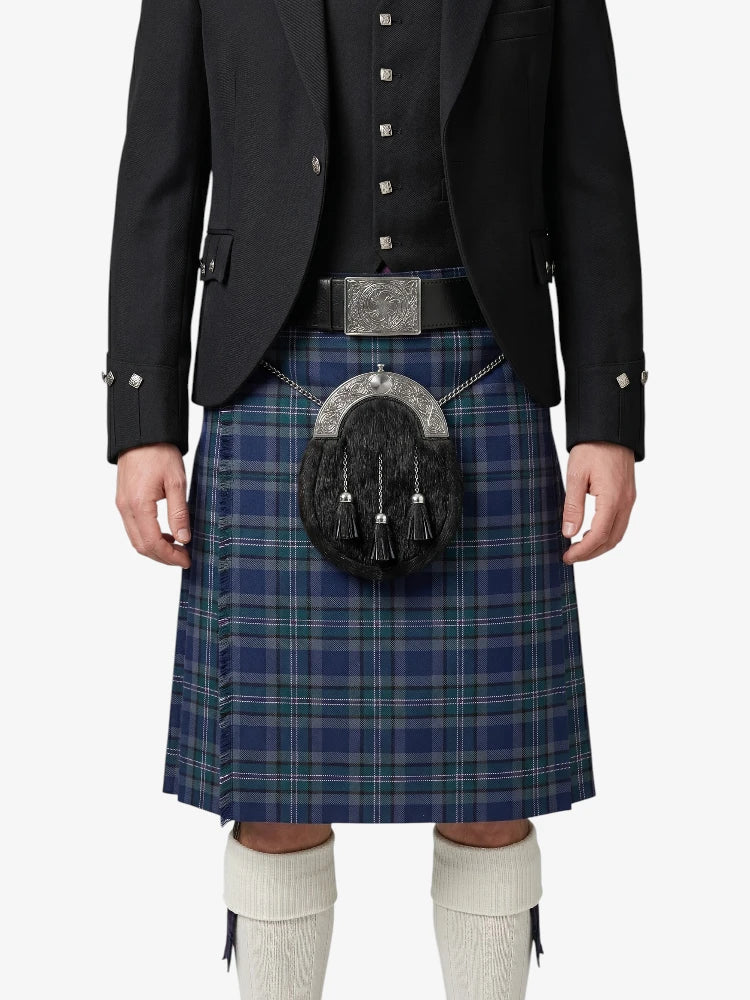 Person wearing a traditional Scottish kilt with a sporran on a white background