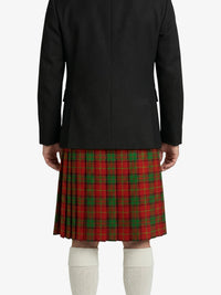 Person wearing a black jacket and red plaid kilt on a white background