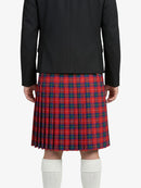 Person wearing a black jacket and red plaid kilt on a white background