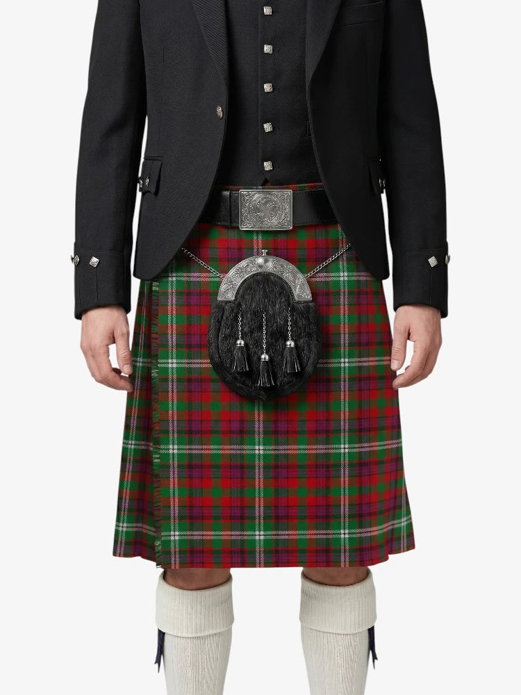 Person wearing a red plaid kilt with a black jacket on a white background