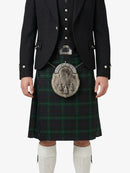 Traditional Scottish kilt with a jacket on a white background