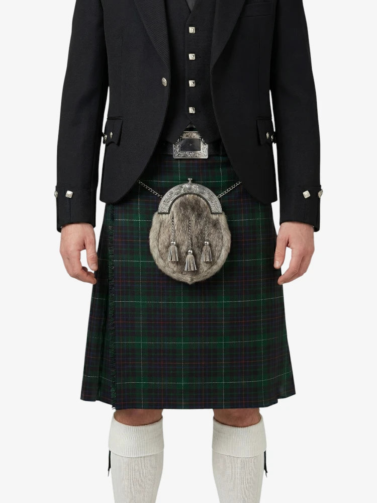 Traditional Scottish kilt with a jacket on a white background