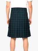 Green plaid kilt worn by a person on a white background