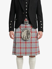 Person wearing a black jacket, red plaid kilt, and white knee-high socks on a white background