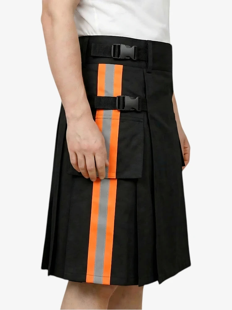 Black kilt with orange and gray stripes worn by a person on a white background