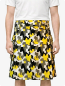 Person wearing a patterned skirt with yellow, black, and gray design on a white background