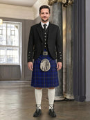 Man wearing a traditional Scottish kilt in an elegant interior setting