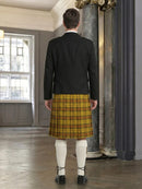 Man wearing a black jacket and yellow plaid kilt in an indoor setting.