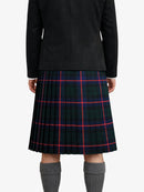 Person wearing a black jacket and plaid kilt on a white background
