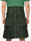 Green kilt worn by a person on a white background