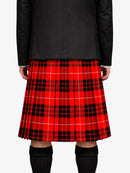 Person wearing a red plaid kilt on a white background