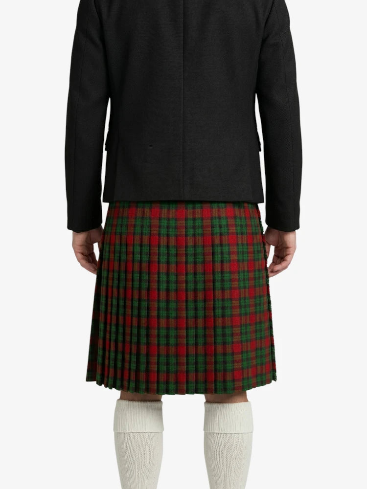 Person wearing a black coat and red plaid kilt on a white background
