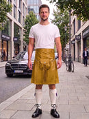 A man stands on a city sidewalk wearing a mustard yellow leather kilt with a front pouch and drawstring, styled over a white t-shirt, white knee-high socks, and black leather shoes. A black Mercedes-Benz car and a bicycle are visible in the background of the street scene.