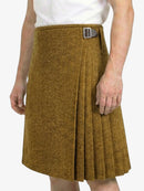 Brown herringbone skirt worn by a person on a white background
