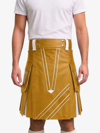 A mustard yellow faux-leather kilt with white graphic line details, worn by a model in a white t-shirt against a light gray background.