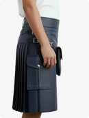 Navy leather kilt with a visible pocket on a plain background